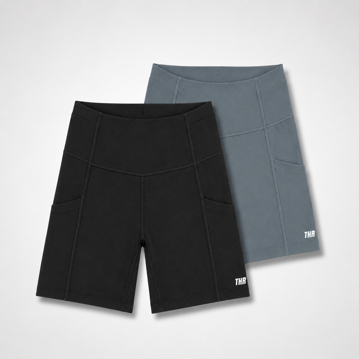 THR9VE ASCENT Running Shorts in black and blue — front view