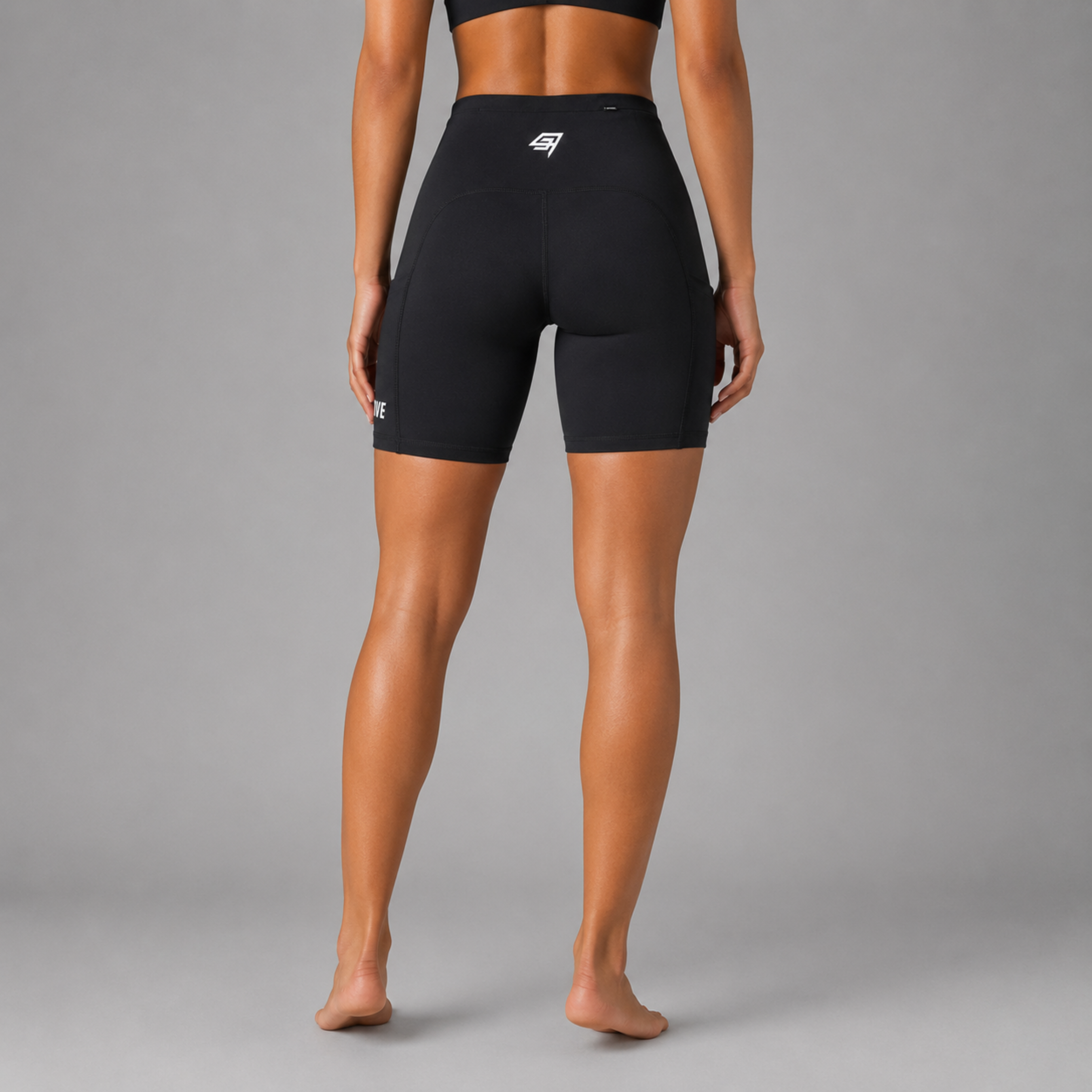 THR9VE ASCENT Running Shorts in black — back view on model