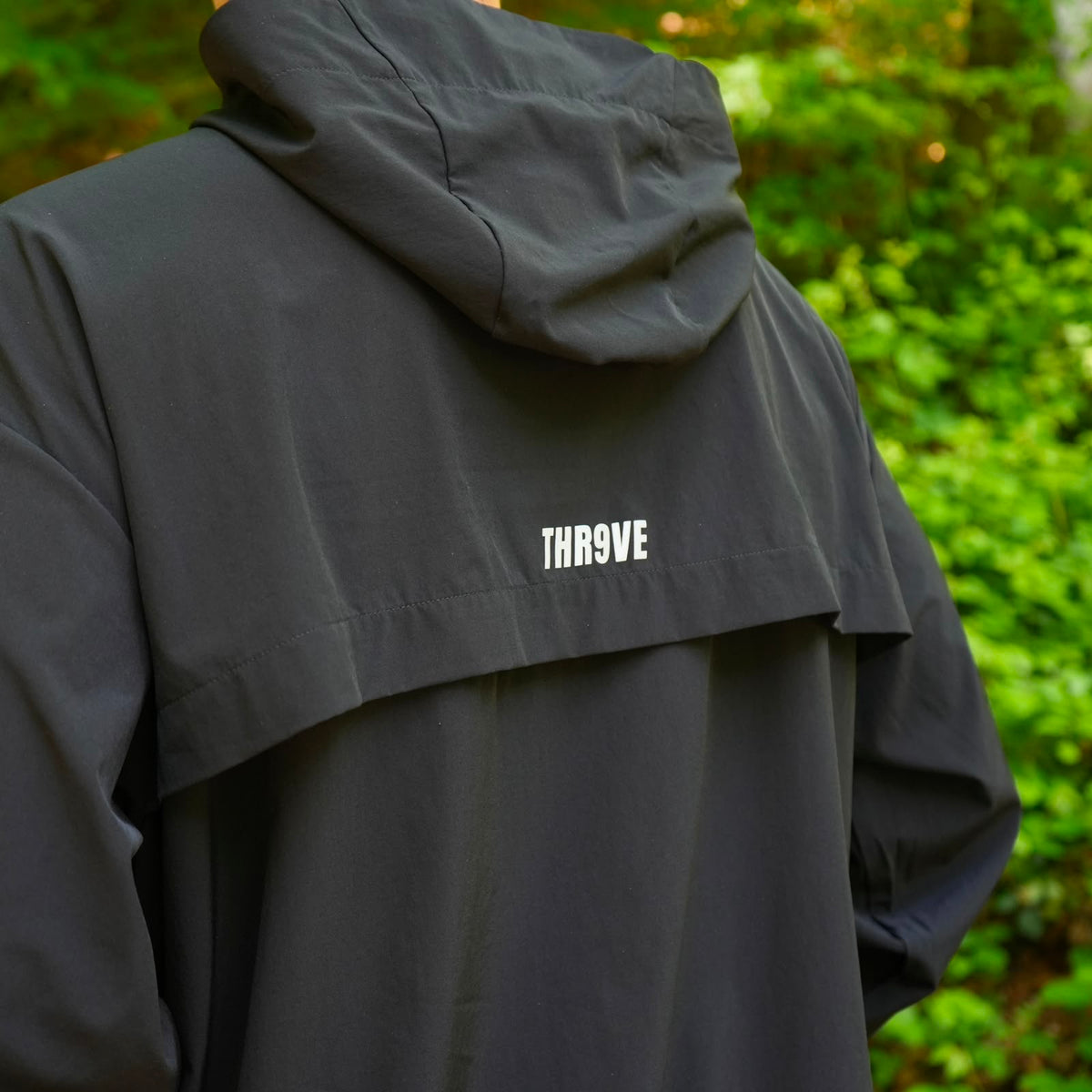 THR9VE PROCESS Lightweight Windbreaker in black — on model, shot 2